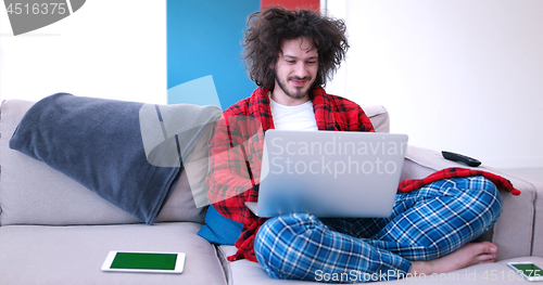 Image of man drinking coffee enjoying relaxing lifestyle