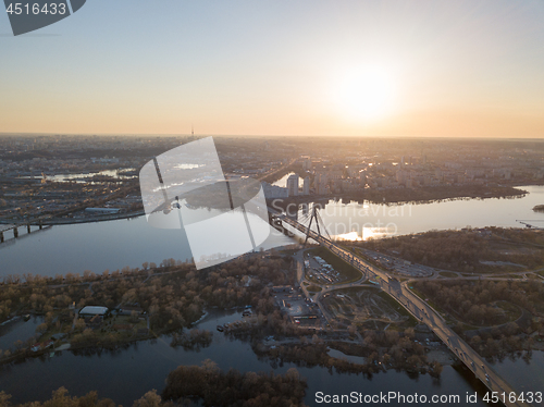 Image of Aerial view on kiev city at sunset. The north bridge over the Dnieper River