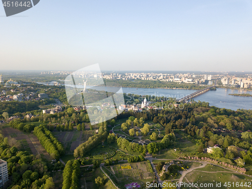 Image of A bird\'s eye view, panoramic view from the drone to the Botanical Garden, Monument to the Motherland, Dnieper River, Paton Bridge in the city of Kiev, Ukraine