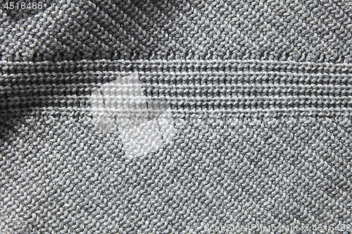 Image of Closeup macro texture of knitted cotton waffle fabric