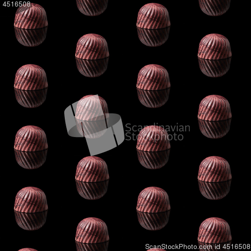 Image of tasty candy on a black texture