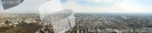 Image of Panoramic photo of the city of Kiev with the stadium Olympic against the blue sky.