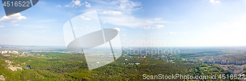 Image of The panoramic bird\'s eye view shooting from drone to Holosiivskyi district with recreational area and urban infrastructure in Kiev, Ukraine at summer sunset.