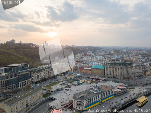 Image of From the bird\'s eye view of the river station, Postal Square with St. Elijah Church , tourist boats and the Andreev Church on the hill in city Kiev, Ukraine.