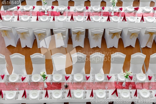 Image of Large dining hall with tables set up