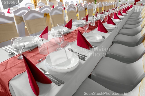 Image of Large dining hall with tables set up