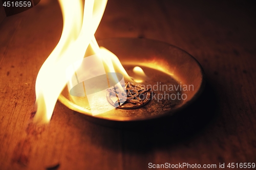 Image of Old pentagram burning in flames