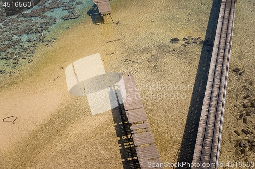 Image of Aerial shot of wooden piers