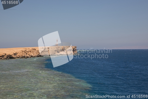 Image of Small island with coral reef