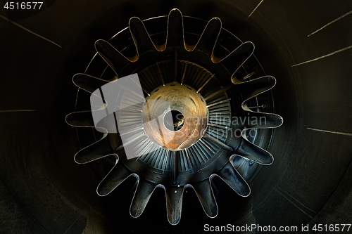 Image of Rusty old jet engine closeup as background