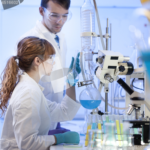 Image of Young chemists researching in life science laboratory.