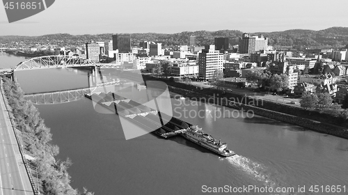 Image of Barge Carries Coal Along Kanawha River and Charleston West Virgi