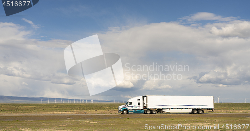 Image of Dramatic Sky High Road Big Rig OTR Transportation