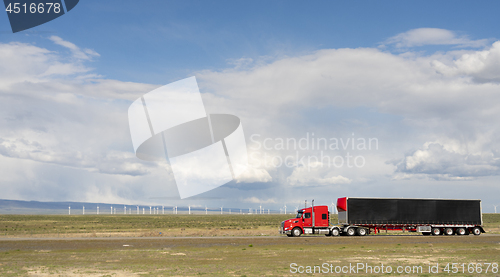 Image of Dramatic Sky High Road Big Rig OTR Transportation