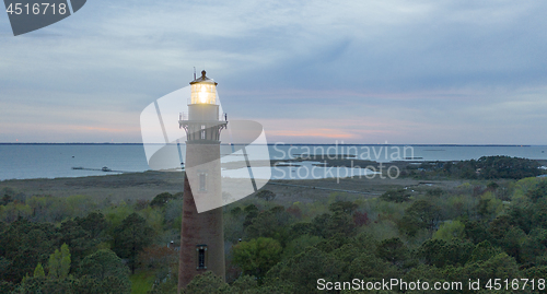 Image of Sun Setting at Currituck Lighthouse Outer Banks North Carolina