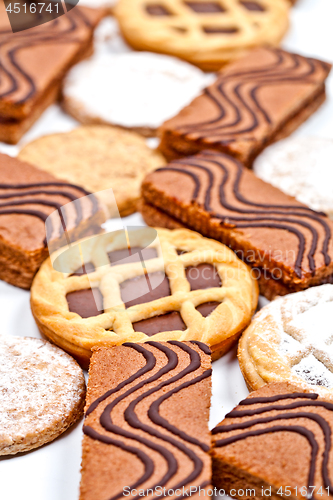 Image of Cake bars filled with cream, oat cookies and tarts with dark cho