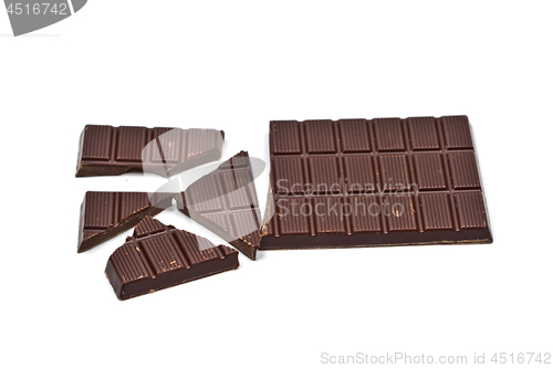 Image of Broken dark chocolate bar isolated on white.