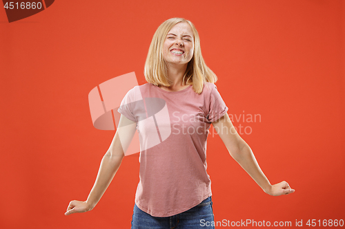 Image of Winning success woman happy ecstatic celebrating being a winner. Dynamic energetic image of female model