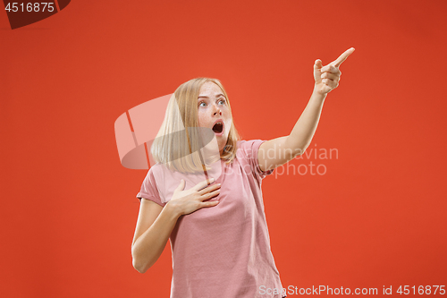 Image of A portrait of surprised screaming woman