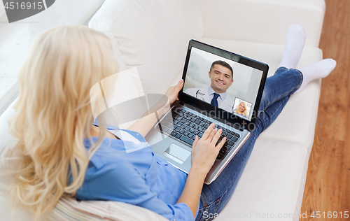 Image of patient having video call with doctor on laptop