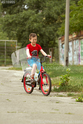 Image of Happy boy ride the bicycle