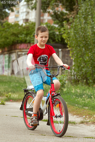 Image of Happy boy ride the bicycle