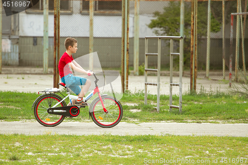 Image of Happy boy ride the bicycle