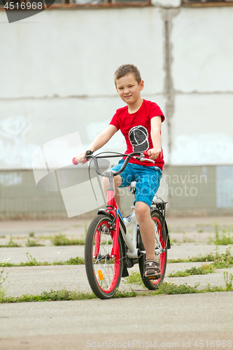 Image of Happy boy ride the bicycle