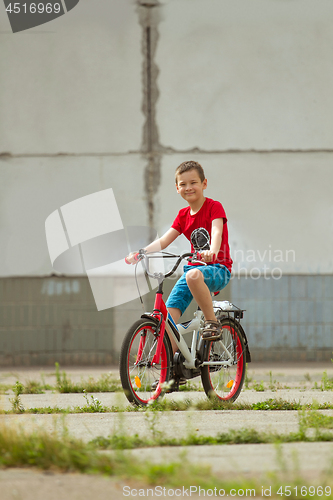 Image of Happy boy ride the bicycle