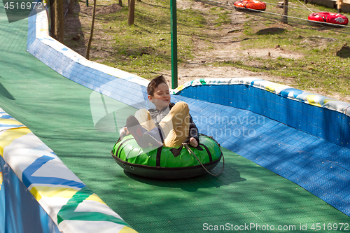 Image of Happy boy with tube