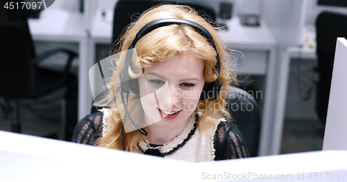 Image of female call centre operator doing her job