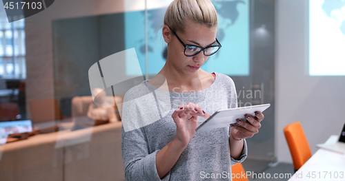 Image of Businesswoman using tablet