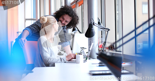 Image of Business People Working With laptop in office