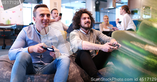 Image of Office Workers Playing computer games