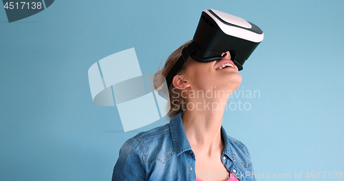 Image of woman using VR headset glasses of virtual reality