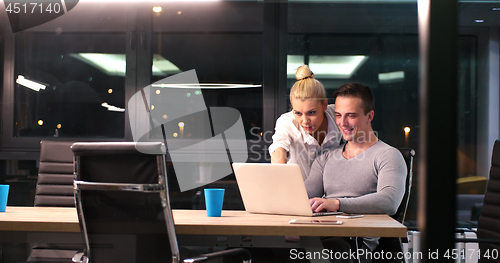 Image of young designers in the night office