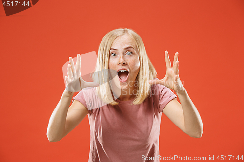 Image of A portrait of surprised screaming woman