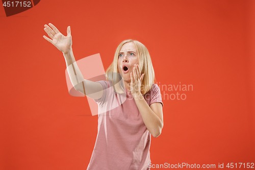 Image of A portrait of surprised screaming woman