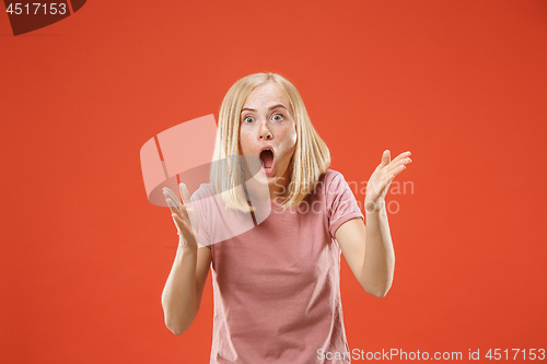 Image of A portrait of surprised screaming woman