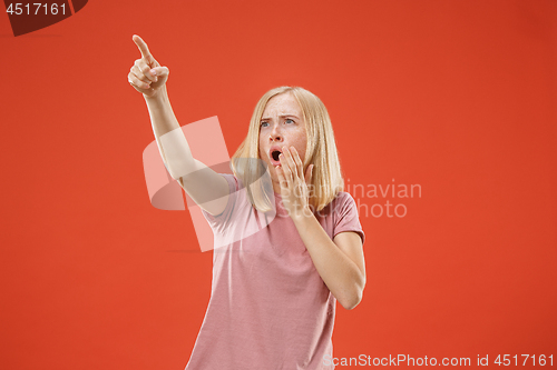 Image of A portrait of surprised screaming woman