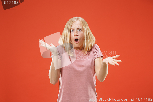 Image of A portrait of surprised screaming woman