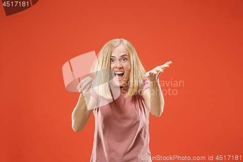 Image of A portrait of surprised screaming woman