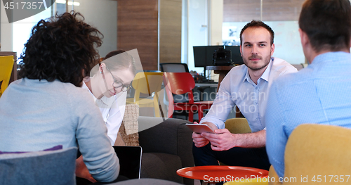 Image of Startup Business Team At A Meeting at modern office building