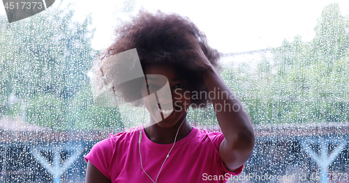 Image of portrait of young afro american woman in gym