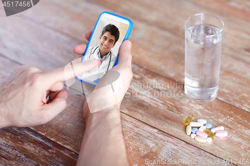 Image of patient having video chat with doctor on cellphone
