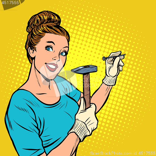 Image of woman hammering a nail