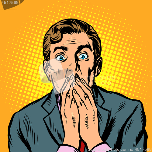 Image of the surprised man covered his mouth with his hands