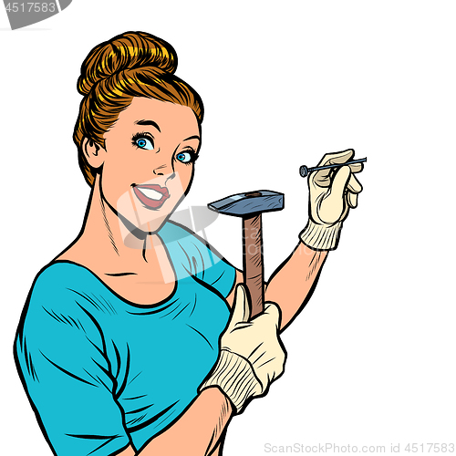 Image of woman hammering a nail