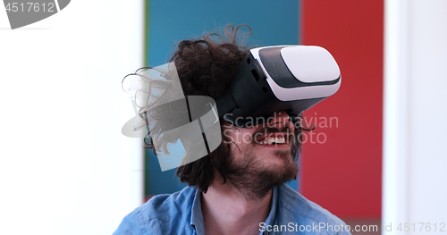 Image of man using VR-headset glasses of virtual reality