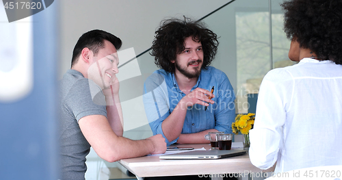 Image of Multiethnic startup business team on meeting
